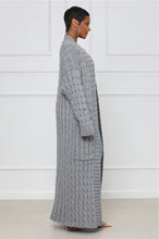 Load image into Gallery viewer, Embrace your cozy & stylish side, a piece that will have you looking and feeling great. Made with the highest quality material, this sweater has a stretchy and soft feel to it. This sweater pairs well with denim, and also provides a unique look when worn with leggings or pants. Pair with pumps and gold accessories for a chic look or jazz it up with flats and hoops during the day!