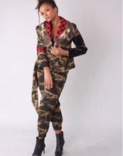 Load image into Gallery viewer, We're in love with this sexy and sophisticated Camo jacket features red checkered material, V-neck collar with accent black sequence sparkles, long sleeves along with belt to tie in front. This Woven print Jacket is easy to style and made of very lightweight material. This coat comes fully lined with a zipper detailing. Pair this with faux leather pants or jeans, a fabulous top and stylish heels or any of your favorite fall looks!