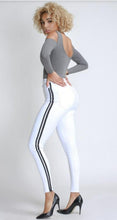 Load image into Gallery viewer, Flex your style in these cute white skinny Jeans with a contrast black stripe designs. Perfect for styling any and every way you want! These jeans come in a high rise fit featuring a raw uneven hem ends, zip and button closure. Pair with a graphic tee or chic fashion top, high heels or combat boots and of course a handbag for a complete look!