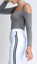 Load image into Gallery viewer, Flex your style in these cute white skinny Jeans with a contrast black stripe designs. Perfect for styling any and every way you want! These jeans come in a high rise fit featuring a raw uneven hem ends, zip and button closure. Pair with a graphic tee or chic fashion top, high heels or combat boots and of course a handbag for a complete look!