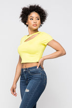 Load image into Gallery viewer, Crop tops are essential in every girls wardrobe and we're obsessing over our vibrant yellow crop top. Featuring a stretch kitted material with short sleeves and a round neckline, and a cut-out detailing which exposes the skin for a real statement-making look. Pair with your favorite blue wash denim jeans or with cargos and high heels to complete the look