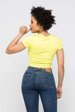 Load image into Gallery viewer, Crop tops are essential in every girls wardrobe and we're obsessing over our vibrant yellow crop top. Featuring a stretch kitted material with short sleeves and a round neckline, and a cut-out detailing which exposes the skin for a real statement-making look. Pair with your favorite blue wash denim jeans or with cargos and high heels to complete the look