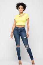 Load image into Gallery viewer, Crop tops are essential in every girls wardrobe and we're obsessing over our vibrant yellow crop top. Featuring a stretch kitted material with short sleeves and a round neckline, and a cut-out detailing which exposes the skin for a real statement-making look. Pair with your favorite blue wash denim jeans or with cargos and high heels to complete the look
