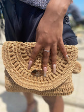 Load image into Gallery viewer, Stylish, sophisticated, and fun! This Pryceless Creations Jezebel woven clutch is the perfect addition to your accessory collection. The Interior features a soft fabric lining as well as a two-change pocket this beautiful clutch also features your gold signature diamond Pryceless Creations Clothing logo in the front. This handmade straw clutch purse adds a modern and playful twist to your wardrobe.