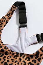 Load image into Gallery viewer, Stand out from the crowd with a sexy pop of print to inspire your new moves. Work out in style with this eye-catching leopard print workout set that comes with a racerback sports bra and high-rise leggings. This style looks great back with the matching tight and a cut out back top to show off the back strap detail. Moisture wicking and breathable, you'll feel cool, comfortable and stylish. This set is perfect if you want to look stylish while working out in gym or studio.