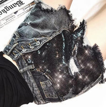 Load image into Gallery viewer, These Black Diamond Sequin are essential for the summer and you need them in your closet! Featuring a frayed hem, black denim material and sequence fabric; what's not to love!? Style with our yellow sneak peak crop top and gold accessories for a complete look!