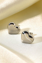 Load image into Gallery viewer, Complete your look with these stylish silver stud earrings. Pryceless Creations Clothing classic heart studs adds a bit of extra elegance to these stud earrings that we love!