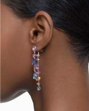 Load image into Gallery viewer, These multicolored drop earrings feature a mix of oval, pear, emerald and navette-cut crystals, arranged in a random formation. An elegant yet playful twist on the essence of Swarovski crystals, wear yours with an off-the-shoulder top to highlight their pastel hues and kinetic craftsmanship.
