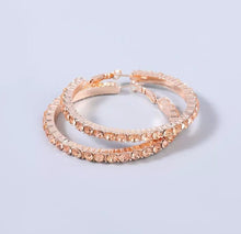 Load image into Gallery viewer, Add some sparkle and shine with these beautifully detailed champagne crystal hoop earrings. Featuring jeweled detailing on rose gold-tone setting, these earrings are perfect for all occasions.