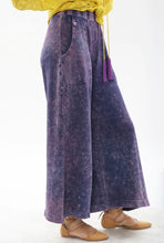 Load image into Gallery viewer, Bring back the 70's with these trendy acid wash French terry wide-leg pants that feature beautiful crystal-embedded buttons. Elastic waistband, Pair with a bodysuit, pumps, or favorite flats and a handbag for the perfect day look.