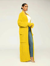 Load image into Gallery viewer, Embrace your cozy & stylish side, a piece that will have you looking and feeling great. Made with the highest quality material, this sweater has a stretchy and soft feel to it. This sweater pairs well with denim, and also provides a unique look when worn with leggings or pants. Pair with pumps and gold accessories for a chic look or jazz it up with flats and hoops during the day!