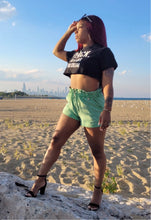 Load image into Gallery viewer, This Keeping It Cute Mini Shorts is ready for the cute brunch or a long weekend away. Featuring diagonal front pockets, front zipper and paper bag silhouette. Pair with clear pumps, a handbag, and a bodysuit to channel urban-chic vibes at brunch or over cocktails with friends.