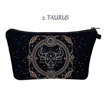Load image into Gallery viewer, Taurus. Whether you’re an imaginative Pisces, a passionate Cancer, or a practical Taurus, the pretty makeup bag Each captures the essence of a zodiac sign with beautiful artwork. The luxe fabric resists dirt, stains, shrinking, and stretching. Perfect for toiletries and makeup. 
