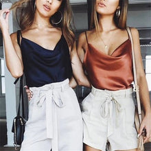 Load image into Gallery viewer, An elevated silk cami that makes a classy and romantic statement. This top is the perfect addition to your wardrobe babe! Featuring a cowl neckline what's not to love?! Style this sexy camisole top with your favorite denim jeans or shorts, transparent mule and handbag for a casual but effortlessly stylish look.