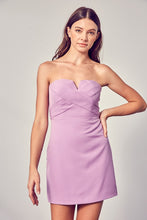 Load image into Gallery viewer, This On My Mind Tube Dress is a sleek and form-fitting strapless dress. This sleek and minimalist garment known for its Asymmetrical V cut design, which highlights the shoulders and neckline. This style provides a flattering and timeless silhouette that can be dressed up with accessories and heels for formal occasions or paired with sandals for a casual, warm-weather look. Its simplicity and versatility make it a must-have addition to any fashion-savvy individual&#39;s wardrobe.
