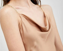 Load image into Gallery viewer, Our Above Status Satin Jumpsuit perfect blend of sophistication and texture that adds a touch of elegance to your wardrobe. This satin jumpsuit features a cowl neck design with intricate trim detailing, meticulously woven to create a unique and visually captivating ensemble.
