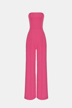 Load image into Gallery viewer, No matter the occasion, the All Inclusive Strapless Jumpsuit is sure to impress!  Featuring ahugging figure with an invisible zip closure at back, princess-seamed bodice with an elasticized back, strapless and welt pockets detailing. This endless strapless jumpsuit in classic solid color is perfect from day to night. Complete it with a mini clutch and heels for a sophisticated look. 
