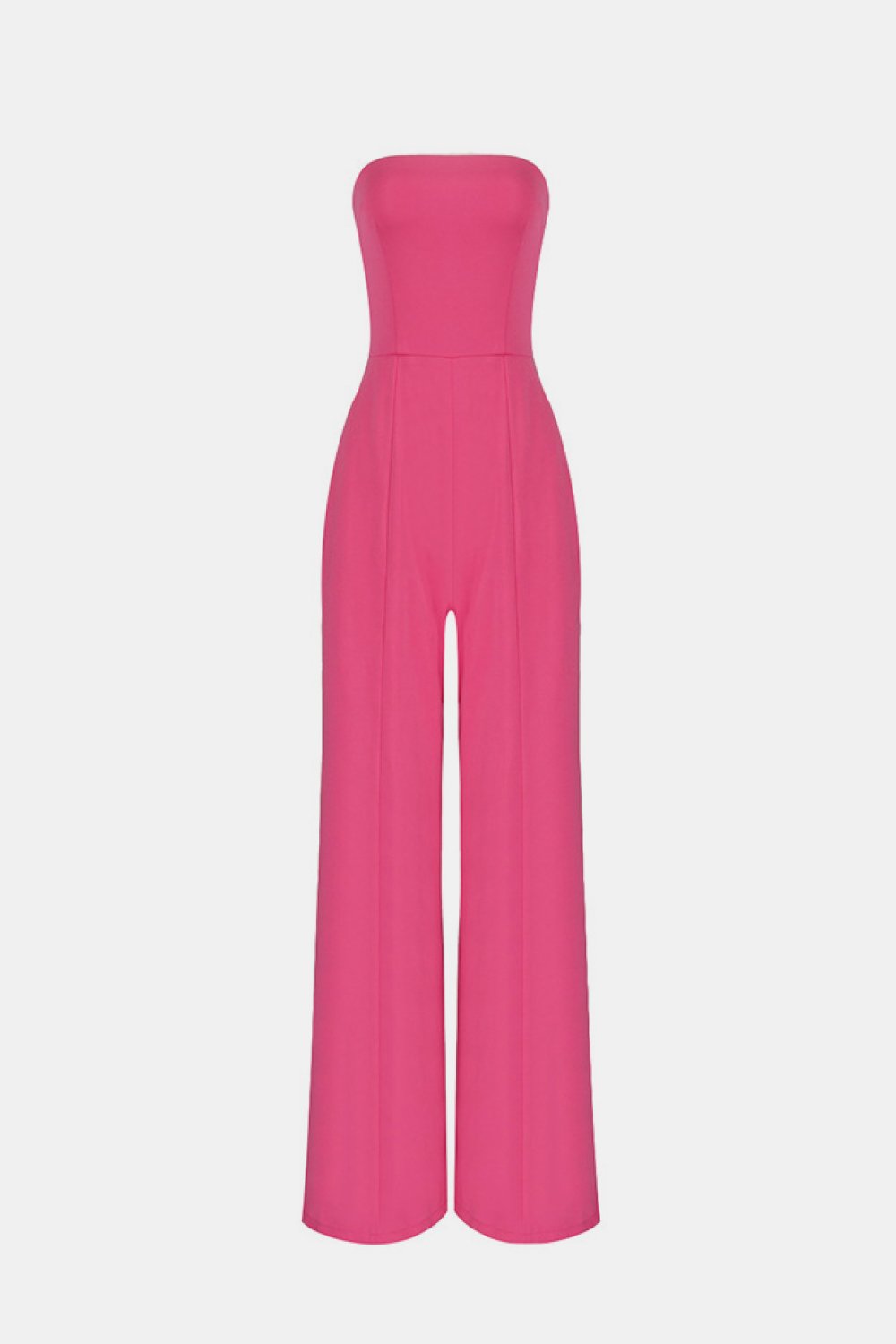 No matter the occasion, the All Inclusive Strapless Jumpsuit is sure to impress!  Featuring ahugging figure with an invisible zip closure at back, princess-seamed bodice with an elasticized back, strapless and welt pockets detailing. This endless strapless jumpsuit in classic solid color is perfect from day to night. Complete it with a mini clutch and heels for a sophisticated look. 
