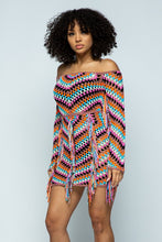Load image into Gallery viewer, We are obsessed! A pretty and feminine multi color crochet dress is right for any girl who&#39;s up for a fun night out! Great to wear at any party day or night, or a date night with your man. This ultra feminine off the shoulder dress comes in a mini length with fringe details. Pair with a classy high heel and mini bag for a look that is guaranteed to have all eyes on you!
