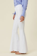 Load image into Gallery viewer, Make a fashion statement in our Vibrant M.i.U High Waisted Flare White Jeans. This jean comes in an extreme flare fit featuring two back patch pockets, faux front pockets, light frayed bottom hem, and a zip-fly closure. Style these jeans with a statement top and a high heel for a look that will have everyone talking.
