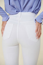 Load image into Gallery viewer, Make a fashion statement in our Vibrant M.i.U High Waisted Flare White Jeans. This jean comes in an extreme flare fit featuring two back patch pockets, faux front pockets, light frayed bottom hem, and a zip-fly closure. Style these jeans with a statement top and a high heel for a look that will have everyone talking.
