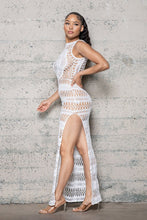 Load image into Gallery viewer, Show off center stage at a grand event wearing this risky maxi dress. This crochet knit split side maxi dress is the staple piece you need for your vacay wardrobe. This crochet maxi dress is perfect layered over a stone bikini, sandals and your vacay essentials for a look like no other.
