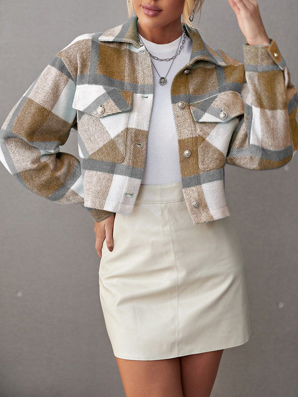 Looking for your perfect shacket? Look no further. This cute plaid jacket is exactly what you need. It is both lightweight and cozy. Add extra layers for cold winter days or keep it plain and simple for warmer months in the year; the versatility is unreal. Pair this jacket with a white bodysuit and Iconic flare denim jeans for a chic look or leggings for a chill day.