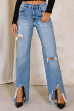 Load image into Gallery viewer, With a high waist and a light wash, these Something New High Rise Distressed Hem Wide Leg Jeans are ideal for dressing up or down. The subtle distressing at the raw hem makes them perfect for taking your style from day to night, while the flared cuffs give a bold look that you won&#39;t want to take off.
