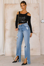 Load image into Gallery viewer, With a high waist and a light wash, these Something New High Rise Distressed Hem Wide Leg Jeans are ideal for dressing up or down. The subtle distressing at the raw hem makes them perfect for taking your style from day to night, while the flared cuffs give a bold look that you won&#39;t want to take off.
