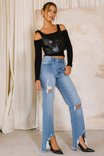 Load image into Gallery viewer, With a high waist and a light wash, these Something New High Rise Distressed Hem Wide Leg Jeans are ideal for dressing up or down. The subtle distressing at the raw hem makes them perfect for taking your style from day to night, while the flared cuffs give a bold look that you won&#39;t want to take off.
