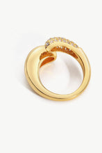 Load image into Gallery viewer, A simplistic yet elegant ring with a geometric style featuring a bypass design fashioned from polished stainless steel and crystals.
