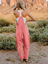 Load image into Gallery viewer, This Sunrise romper features a striking V- neckline, pockets and lots of stretch for added comfort, this full-size sleeveless jumpsuit comes in a variety of colors. Our Sunrise jumpsuit is stylish, comfortable and its lightweight fabric makes it ideal for summer or fall events, such as brunch or a family BBQ. Style with a bag and your favorite sandals for a complete look.

