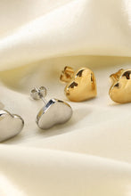 Load image into Gallery viewer, Complete your look with these stylish silver and gold stud earrings. Pryceless Creations Clothing classic heart studs adds a bit of extra elegance to these stud earrings that we love! 
