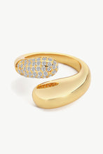 Load image into Gallery viewer, A simplistic yet elegant ring with a geometric style featuring a bypass design fashioned from polished stainless steel and crystals.
