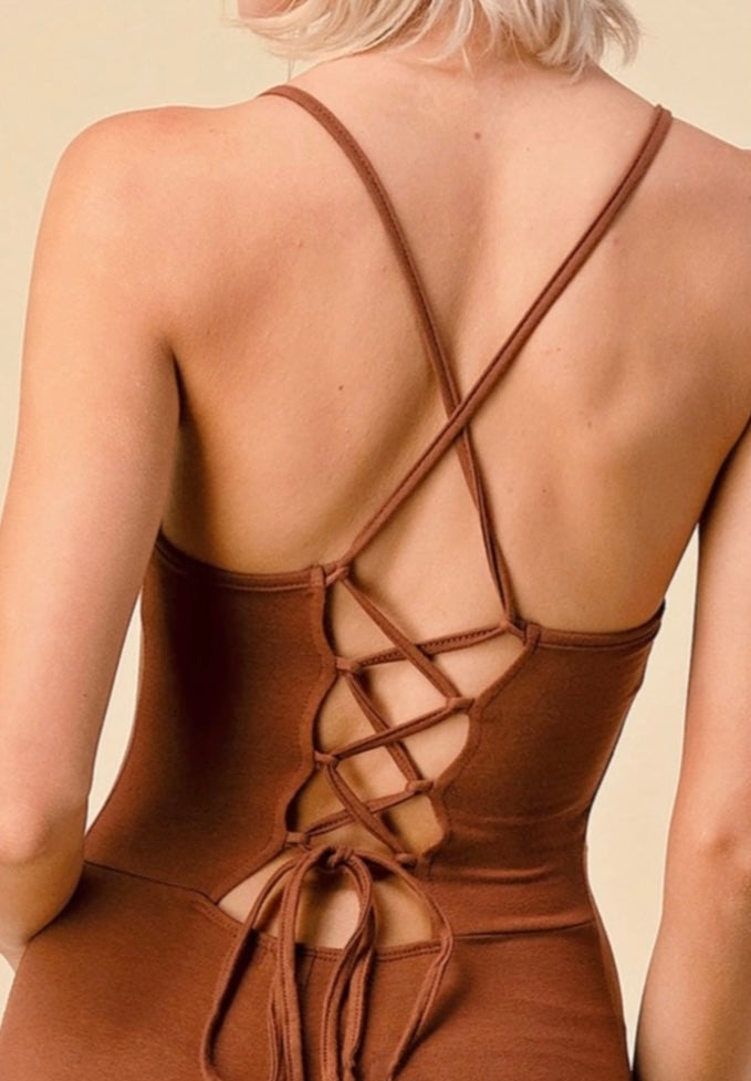 Fit for every season! Comfort never looked so sexy. All tied up Chocolate jumpsuit is made from flexible, soft, and stretchy cotton material and features a spaghetti strap, Pair this catsuit with stylish high heels and handbag for a complete look.
