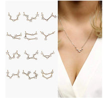 Load image into Gallery viewer, Keep your lucky stars with you at all times with the Gemini Astrology Constellation Necklace. A unique and cute dainty necklace you can wear to any occasion. Carry your love for astrology and connection to your birth sign everywhere you go with this zodiac necklace.
