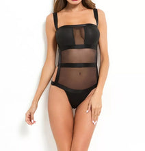 Load image into Gallery viewer, Bad Gyal Riri Bodysuit- Black We&#39;re bringing you the ultimate sheer mesh cut out bodysuit! Perfect for building your favorite looks all year round. This bodysuit comes in a luxurious sheer fabric with satin ribbon straps featuring a plunging square neckline sexy cut out back and snap seat closure. Made of materials that allow great stretch and breathable fabric. Style it with a blazer and jeans or one of our sexy pleated skirts matching high waist legging and heels to create a casual-chic look.
