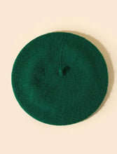Load image into Gallery viewer, We&#39;re obsessing over this chic dark green beret! This classic style beret features a woven wool material. Pair with dangle earrings and your favorite outfit and voila! Your outfit is complete!

