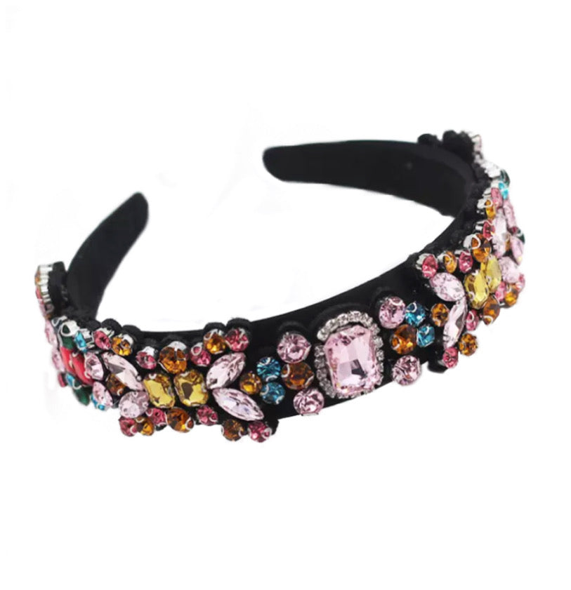 The black crystal headband is beautiful and elegant. Multicolor rhinestones. Wear with a luxurious black dress or your favorite jeans and t-shirt. It always looks perfect. Is extremely comfortable and this headband makes a glamorous statement piece.