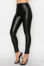 Load image into Gallery viewer, Obsessed is an understatement when it comes to these vegan leather leggings. This is surely a piece for your closet! Material that allows great stretch this pant sculpts your body in all the right places. These trendy pants are skinny fit, high rise waistband and front zipper detailing. Pair with a sexy bodysuit and high heels to give your look an edgy but stylish finish to complete your look. 
