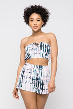 Load image into Gallery viewer, Keep it totally trendy in tie dye and get in touch with your playful side! This multi color crop top features a strapless neckline and a elastic band hem. The vibrant blues, pink, and lilac and compose a fun tie dye pattern. Pair this set with a simple high heels, silver accessories and mini bag for a complete look. 
