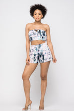 Load image into Gallery viewer, Keep it totally trendy in tie dye and get in touch with your playful side! This multi color crop top features a strapless neckline and a elastic band hem. The vibrant blues, pink, and lilac and compose a fun tie dye pattern. Pair this set with a simple high heels, silver accessories and mini bag for a complete look. 
