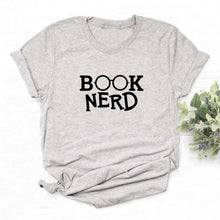 Load image into Gallery viewer, If you love to read books this shirt is for you. Get cozy and snug with hot coco and a book. Style this with your favorite denim jeans, high heels and handbag for an effortless outfit of the day.
