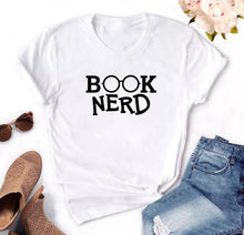 Load image into Gallery viewer, If you love to read books this shirt is for you. Get cozy and snug with hot coco and a book. Style this with your favorite denim jeans, high heels and handbag for an effortless outfit of the day.
