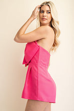 Load image into Gallery viewer, Be sure to stand out in sweeter than ever romper wherever you go from day to night in style! Featuring shapes, a strapless neckline, halter necktie, elastic at the back and a cut out front, textured woven fabric and princess bow. Totally on-trend, tie-front detail accents this chic romper perfectly while pleated shorts complete the look! Hidden back zipper/clasp.
