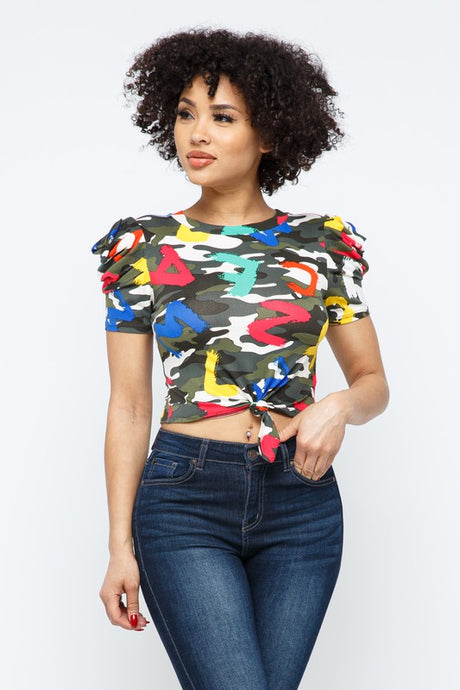 This cute and casual top can be dressed up or down depending on your mood. Complete the look by pairing the alpha camo crop top with jeans, a denim jacket, and white sneakers.