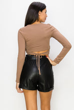 Load image into Gallery viewer, Keep it casual and chic with our crop top that is essential to your layered outfits! The top features a crew neck, long sleeves, and a cropped hem. Featuring a knit fabric that offers a form-hugging fit with a moderate stretch. Complete look with our Hybrid Dream Jeans and some transparent high heels.
