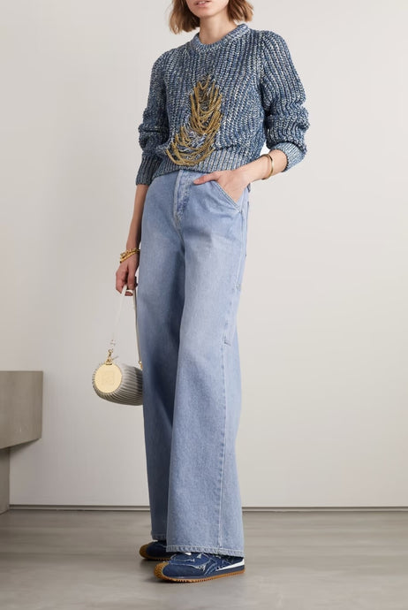 This chain me up sweater belongs in your winter essentials babe! Perfect to wear on a casual day out; this sweater is cute and versatile. This knitted sweater features long gold chain in the front and a crewneck collar. Wear this with your favorite jeans or our taupe faux leather pants and booties for the perfect rock star fall look.