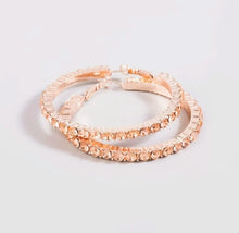 Load image into Gallery viewer, Add some sparkle and shine with these beautifully detailed champagne crystal hoop earrings. Featuring jeweled detailing on rose gold-tone setting, these earrings are perfect for all occasions.
