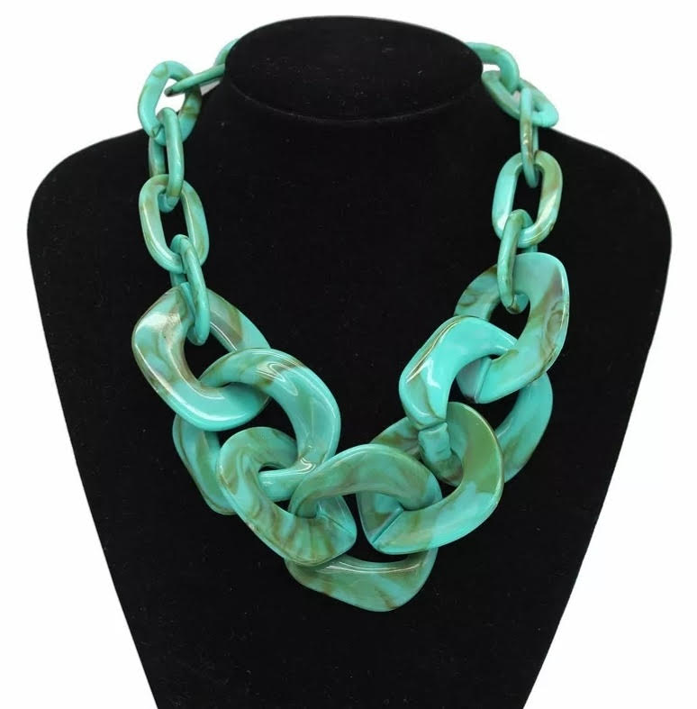 This flawless chunky Turquoise acrylic necklace set is a dream. Not only will it give you the party look you desire, but also make it simple to transition from summer to fall and even winter.
